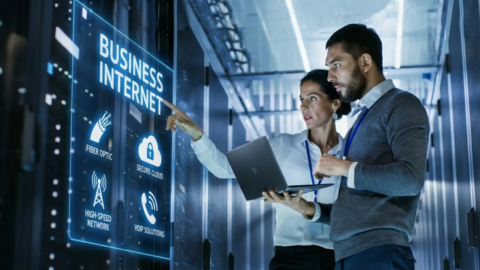 IT professionals managing business internet network infrastructure and connectivity in a data center
